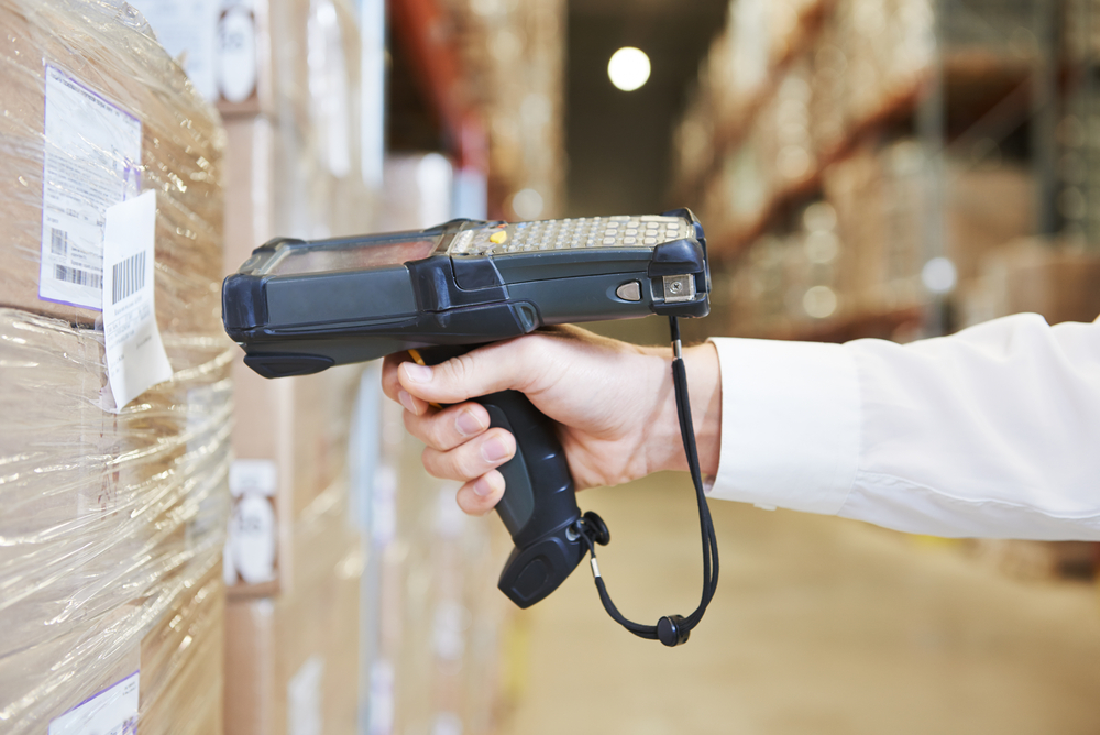warehouse worker scanning box