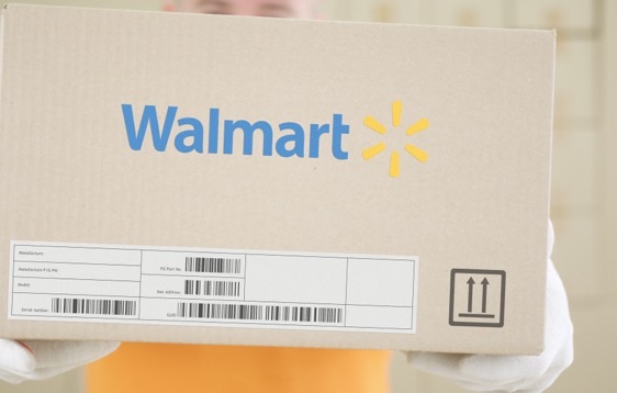 Walmart shipping box held by a fulfillment worker
